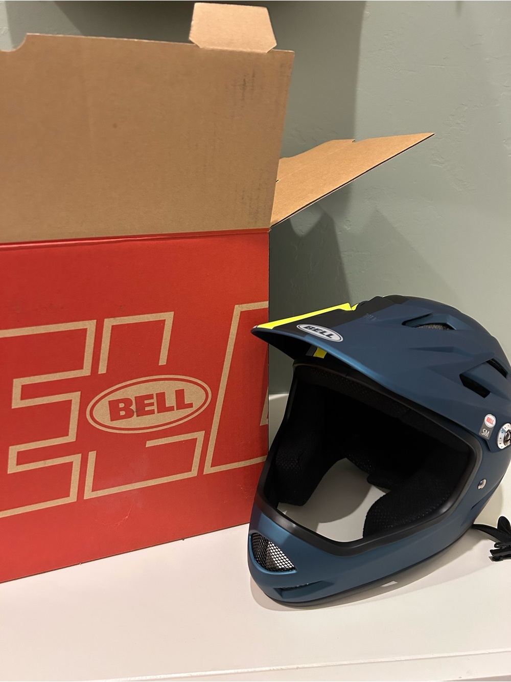 Bellroy matte navy full-face helmet with yellow accent